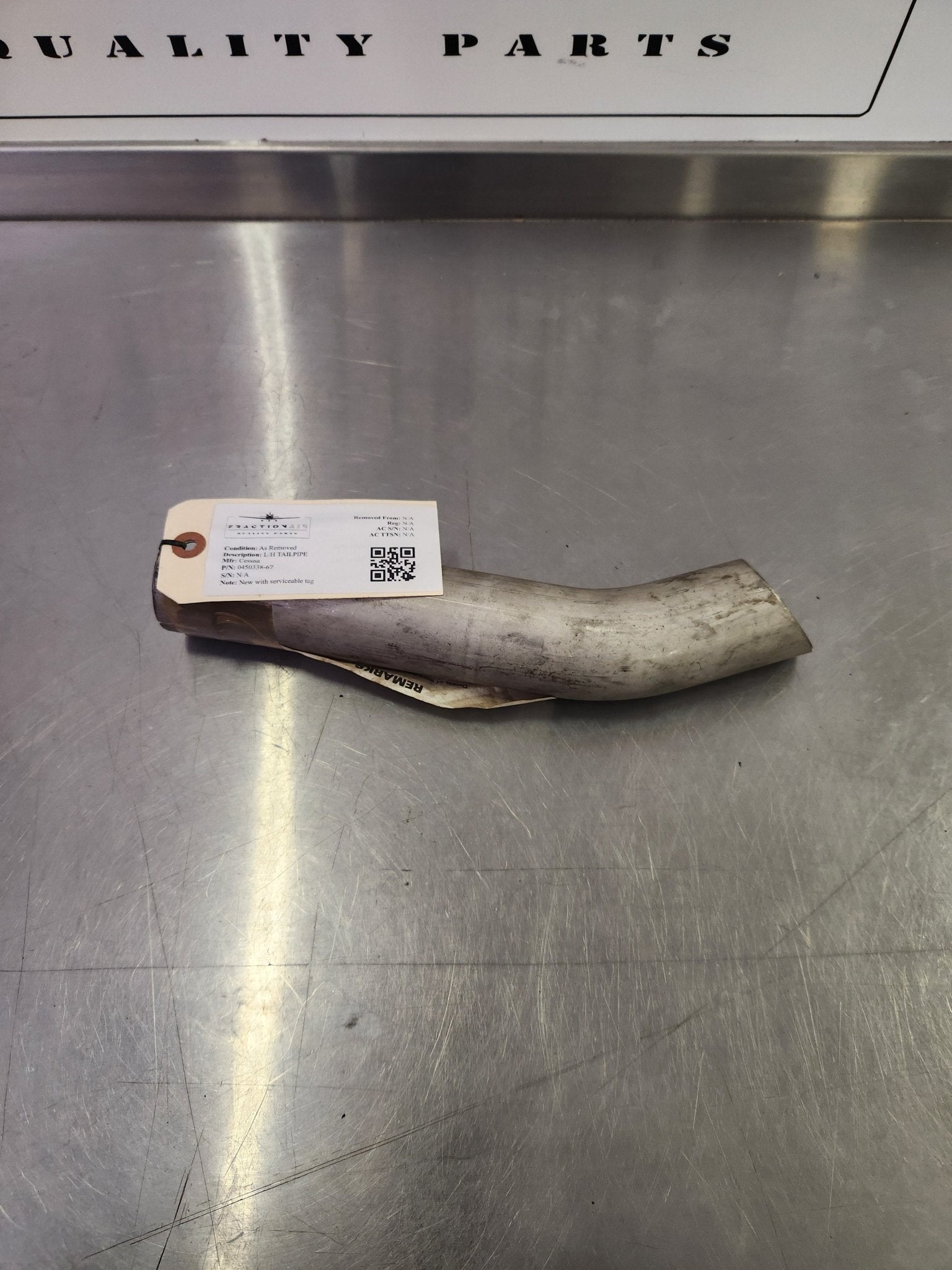 0450338 - 67 Cessna L/H TAILPIPE | FractionAIR Parts - Aircraft Parts & Accessories