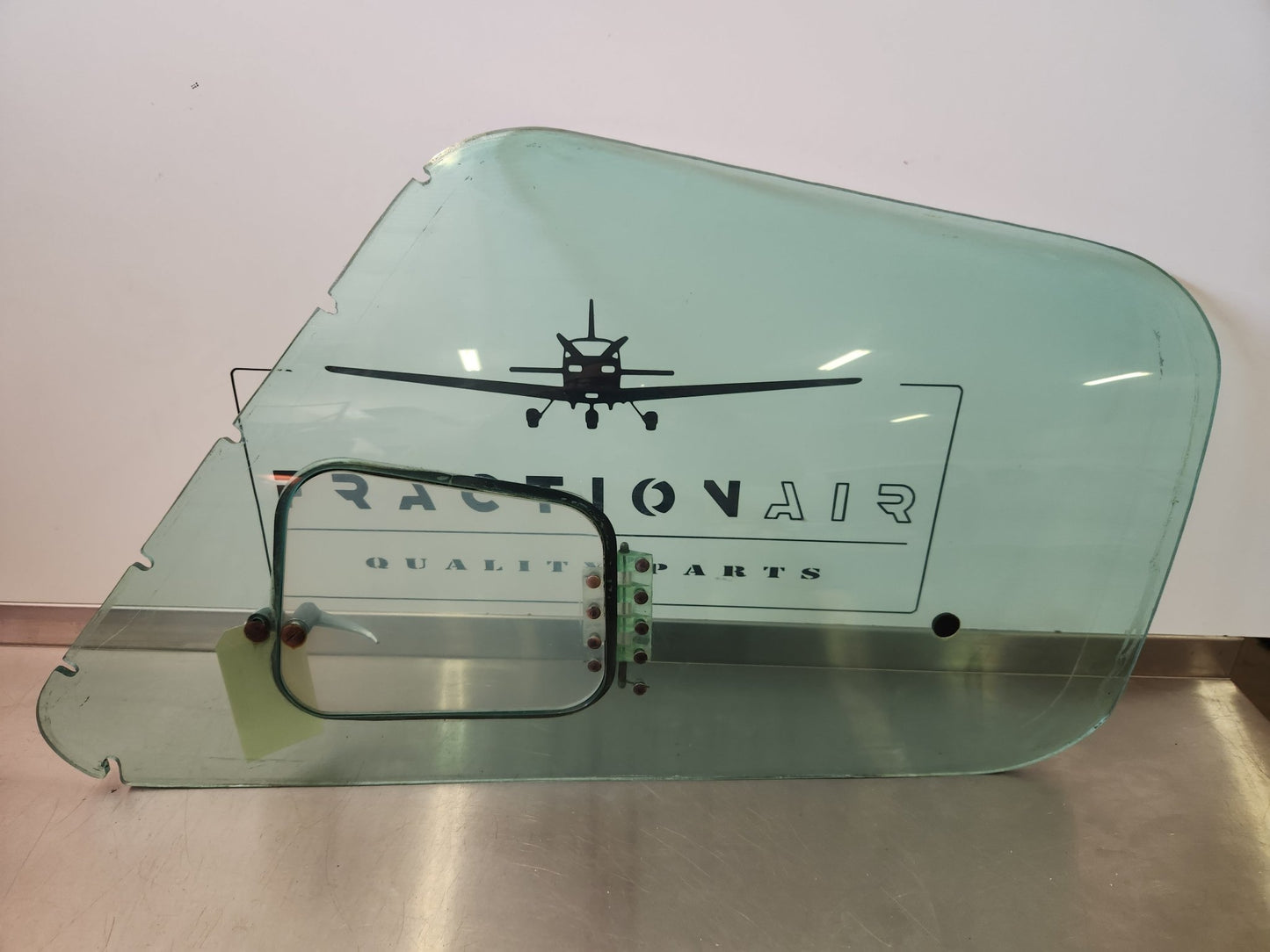 5011177 - 9, 5011167 - 57 Cessna WINDOW ASSY - FRONT LH W/ STORM WINDOW AND HANDLE | FractionAIR Parts - Aircraft Parts & Accessories