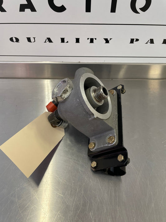 54J21078 Piper PA - 46 - 350P Oil Filter Adapter Assy with Mount Bracket ALT: LW - 13906 | FractionAIR Parts - Aircraft Parts & Accessories
