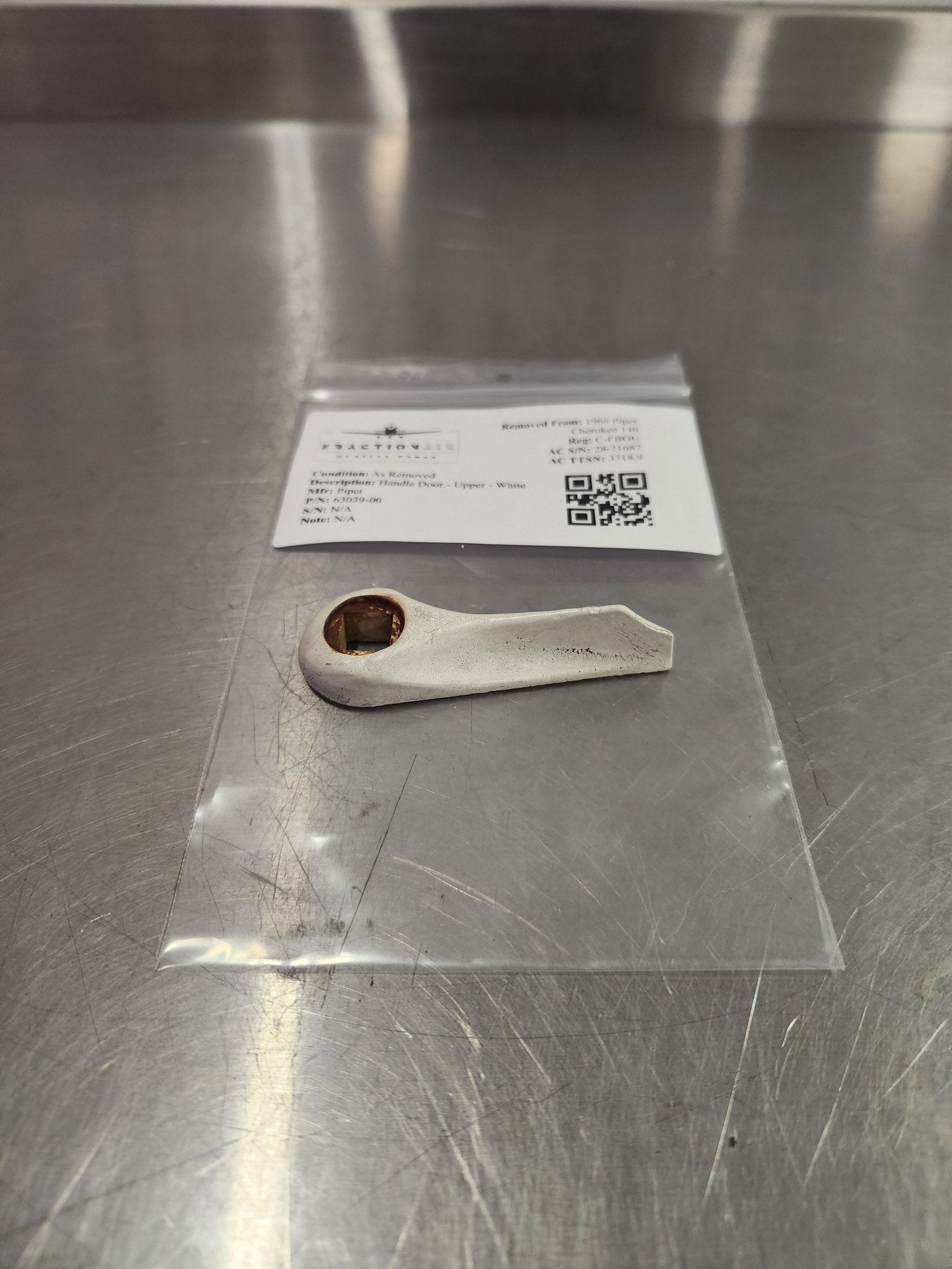 63039 - 00 Piper Handle Door - Upper - White | FractionAIR Parts - Aircraft Parts & Accessories