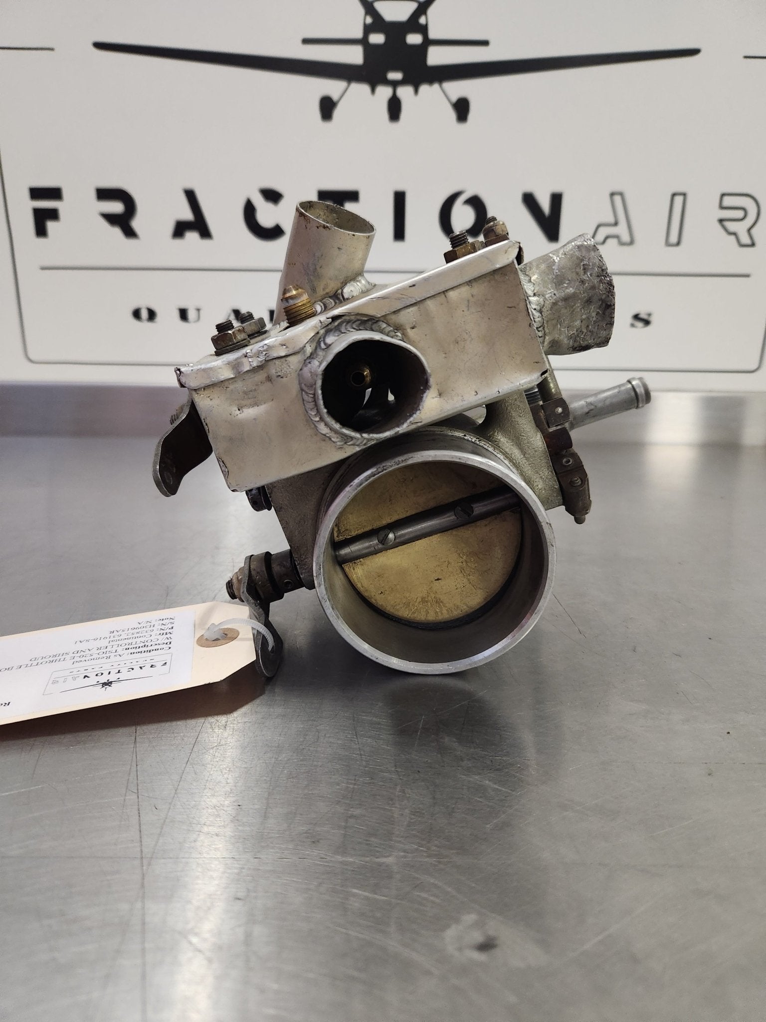 632852, 631916 - 8A1 Continental TSIO - 520 - E THROTTLE BODY ASSY W/ CONTROLLER AND SHROUD | FractionAIR Parts - Aircraft Parts & Accessories