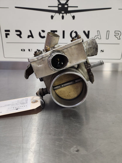 632852, 631916 - 8A1 Continental TSIO - 520 - E THROTTLE BODY ASSY W/ CONTROLLER AND SHROUD | FractionAIR Parts - Aircraft Parts & Accessories